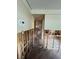 Unfinished hallway with new flooring, undergoing renovation at 6176 Island Dr, Weeki Wachee, FL 34607