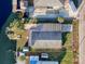 Single-story home with carport and backyard access to canal at 6176 Island Dr, Weeki Wachee, FL 34607