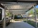 Carport with boat ramp access at 6176 Island Dr, Weeki Wachee, FL 34607
