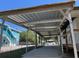 The carport offers covered parking with a metal roof at 6176 Island Dr, Weeki Wachee, FL 34607