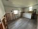 Unfinished bedroom with new flooring, ready for customization at 6176 Island Dr, Weeki Wachee, FL 34607