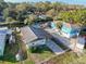 Single-story home on canal with neighboring houses visible at 6176 Island Dr, Weeki Wachee, FL 34607