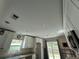 High ceilings and recessed lighting in the kitchen area at 6176 Island Dr, Weeki Wachee, FL 34607