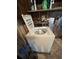 Older model top-load washer in laundry room at 6176 Island Dr, Weeki Wachee, FL 34607