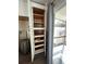 White kitchen cabinets with ample storage space and wood drawers at 6176 Island Dr, Weeki Wachee, FL 34607