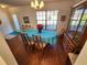 Spacious dining area with hardwood floors and a large window at 6580 Brambleleaf Dr, Spring Hill, FL 34606