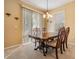 Elegant dining room with a wood table and matching chairs at 7650 Red Mill Cir, New Port Richey, FL 34653