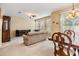 Spacious living room with carpeted floors and neutral color palette at 7650 Red Mill Cir, New Port Richey, FL 34653