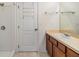 Clean bathroom with shower, vanity, and mirror at 7650 Red Mill Cir, New Port Richey, FL 34653