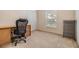 Home office with desk, chair, and storage unit at 7650 Red Mill Cir, New Port Richey, FL 34653