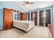 Spacious bedroom with built-in wardrobe and large windows at 7650 Red Mill Cir, New Port Richey, FL 34653
