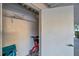 Storage closet with shelving and space for mobility devices at 11231 Dollar Lake Dr # 4, Port Richey, FL 34668