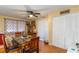 Simple dining area with glass-top table and four chairs at 15134 Peoria Ave, Hudson, FL 34667