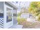 Backyard view showing patio area, shed, and screened porch at 15134 Peoria Ave, Hudson, FL 34667