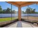 Enjoy the view from this screened patio at 15724 Peruvian Lily Ct, Brooksville, FL 34604