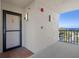 Exterior view of condo building entrance with balcony and water views at 4620 Bay Blvd # 1148, Port Richey, FL 34668