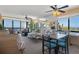 Spacious living room with water views, comfortable seating, and dining area at 4620 Bay Blvd # 1148, Port Richey, FL 34668