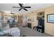 Living room with fireplace, comfortable seating and water views at 4620 Bay Blvd # 1148, Port Richey, FL 34668