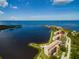 Aerial view showing building location, waterfront access and community amenities at 4620 Bay Blvd # 1148, Port Richey, FL 34668