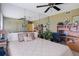 Guest bedroom with built-in desk and mirrored walls at 4620 Bay Blvd # 1148, Port Richey, FL 34668