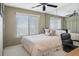 Guest bedroom with mirror closet and ceiling fan at 4620 Bay Blvd # 1148, Port Richey, FL 34668