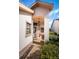 Inviting entryway with terracotta tile flooring and covered porch at 6244 Fairskies Dr, New Port Richey, FL 34655