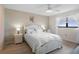 Bright bedroom with a comfy queen-size bed and ensuite bathroom access at 8141 Aquila St # 347, Port Richey, FL 34668
