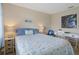 Bedroom with a queen-size bed and a workspace at 8141 Aquila St # 347, Port Richey, FL 34668