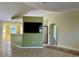 Modern kitchen with a breakfast bar and stainless steel appliances at 10448 Canary Ave, Weeki Wachee, FL 34613