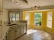 Modern kitchen with quartz countertops and stainless steel appliances at 10448 Canary Ave, Weeki Wachee, FL 34613