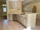Kitchen with stainless steel appliances and an island at 10448 Canary Ave, Weeki Wachee, FL 34613