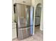 Stainless steel refrigerator in the kitchen at 10448 Canary Ave, Weeki Wachee, FL 34613