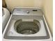 Top-load Samsung washer in a clean laundry room at 10448 Canary Ave, Weeki Wachee, FL 34613