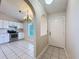 Bright kitchen with stainless steel appliances and an arched entryway at 11084 Marquette St, Spring Hill, FL 34609