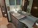 Bathroom with double vanity and updated fixtures at 12266 Birch St, Brooksville, FL 34613