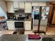 Kitchen boasts granite counters and stainless steel appliances at 12266 Birch St, Brooksville, FL 34613
