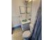 Classic bathroom with a light blue sink and matching trim creates a cool, vintage charm at 12266 Birch St, Brooksville, FL 34613
