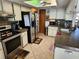 Kitchen with granite countertops and stainless steel appliances at 12266 Birch St, Brooksville, FL 34613