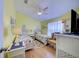Guest bedroom with twin beds, ample closet space and natural light at 13600 Crest Lake Dr, Hudson, FL 34669