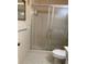 Bathroom featuring a shower stall and toilet at 2260 Costa Rican Dr # 26, Clearwater, FL 33763