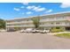 Two-story condo building with ample parking and a well-maintained exterior at 2260 Costa Rican Dr # 26, Clearwater, FL 33763