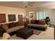 Living room with comfy seating, neutral colors, and lots of natural light at 2260 Costa Rican Dr # 26, Clearwater, FL 33763