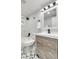Clean bathroom with a bathtub, updated vanity, and stylish tile floor at 3452 Umber Rd, Holiday, FL 34691