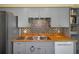 Kitchen with butcher block countertops and updated sink at 7425 Baywood Forest Cir, Spring Hill, FL 34606