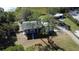 Home situated on a spacious lot with mature trees at 8700 Ross Ln, New Port Richey, FL 34654