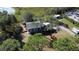House with a large backyard, located near water at 8700 Ross Ln, New Port Richey, FL 34654