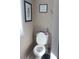 This bathroom features a toilet at 8700 Ross Ln, New Port Richey, FL 34654