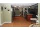 Open concept kitchen with stainless steel appliances and tile floors at 8700 Ross Ln, New Port Richey, FL 34654