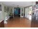 Eat-in kitchen with stainless steel appliances and tile floors at 8700 Ross Ln, New Port Richey, FL 34654