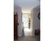 A laundry room with a door leading to the outside at 8700 Ross Ln, New Port Richey, FL 34654